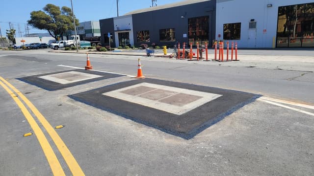 new public city road concrete and asphalt repair job 