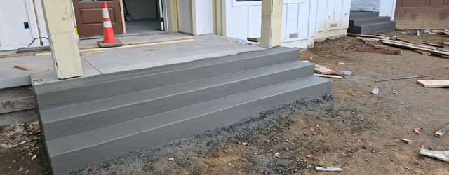 new concrete steps in front of a home