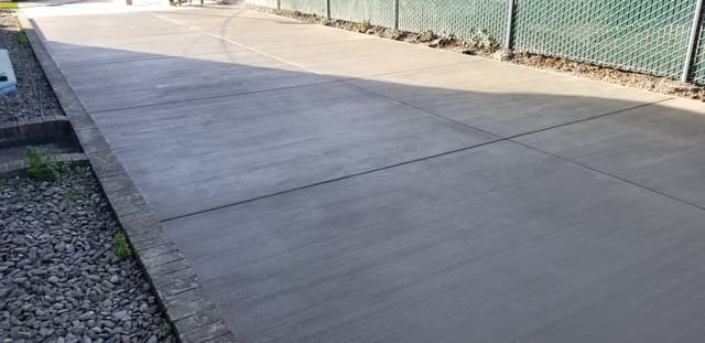 New concrete driveway of a residential home