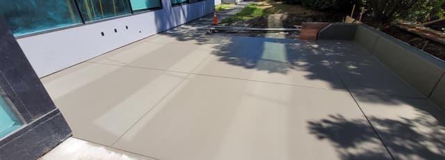 private backyard concrete patio deck